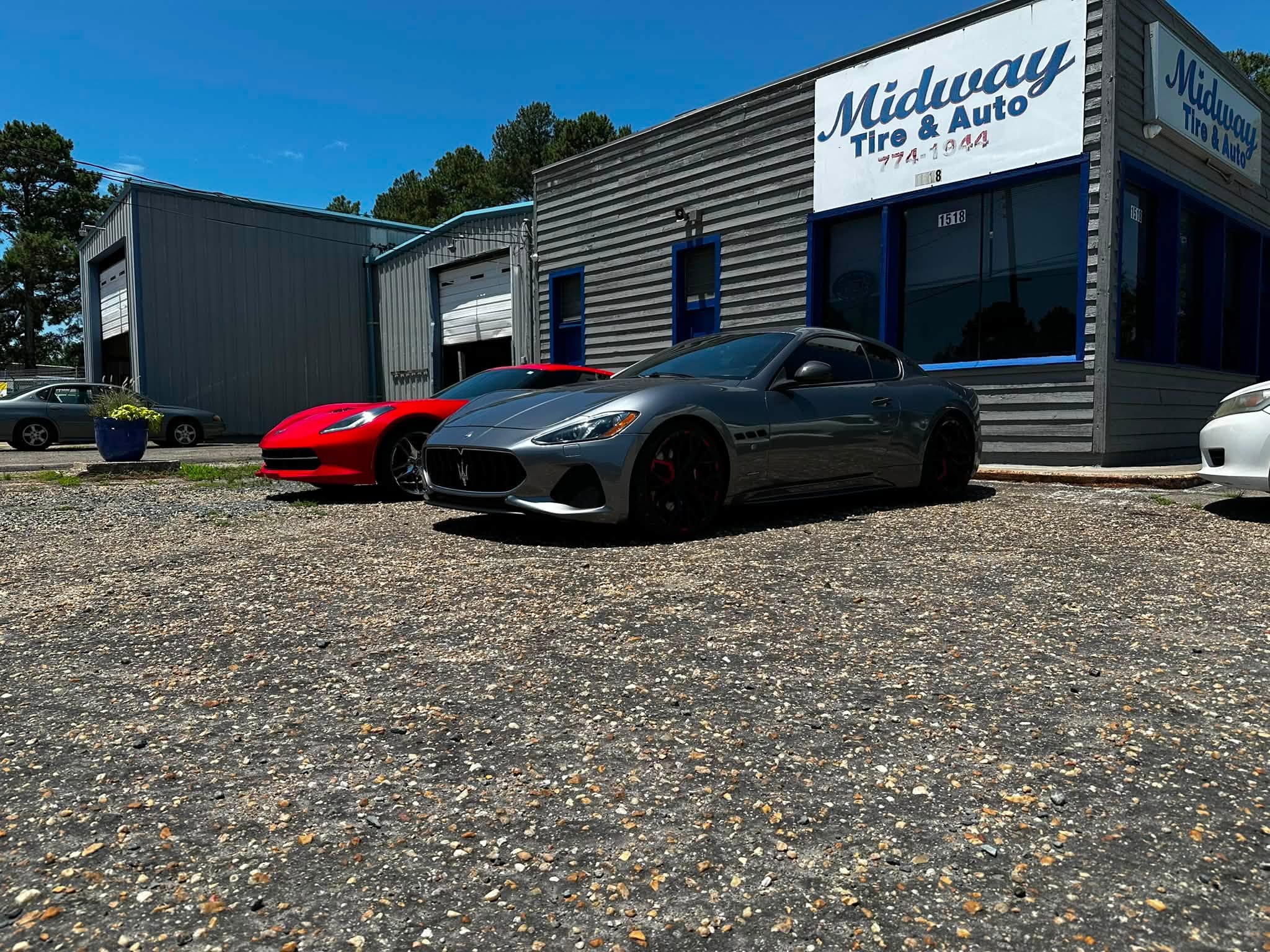 Vehicles outside Midway Tire and Auto
