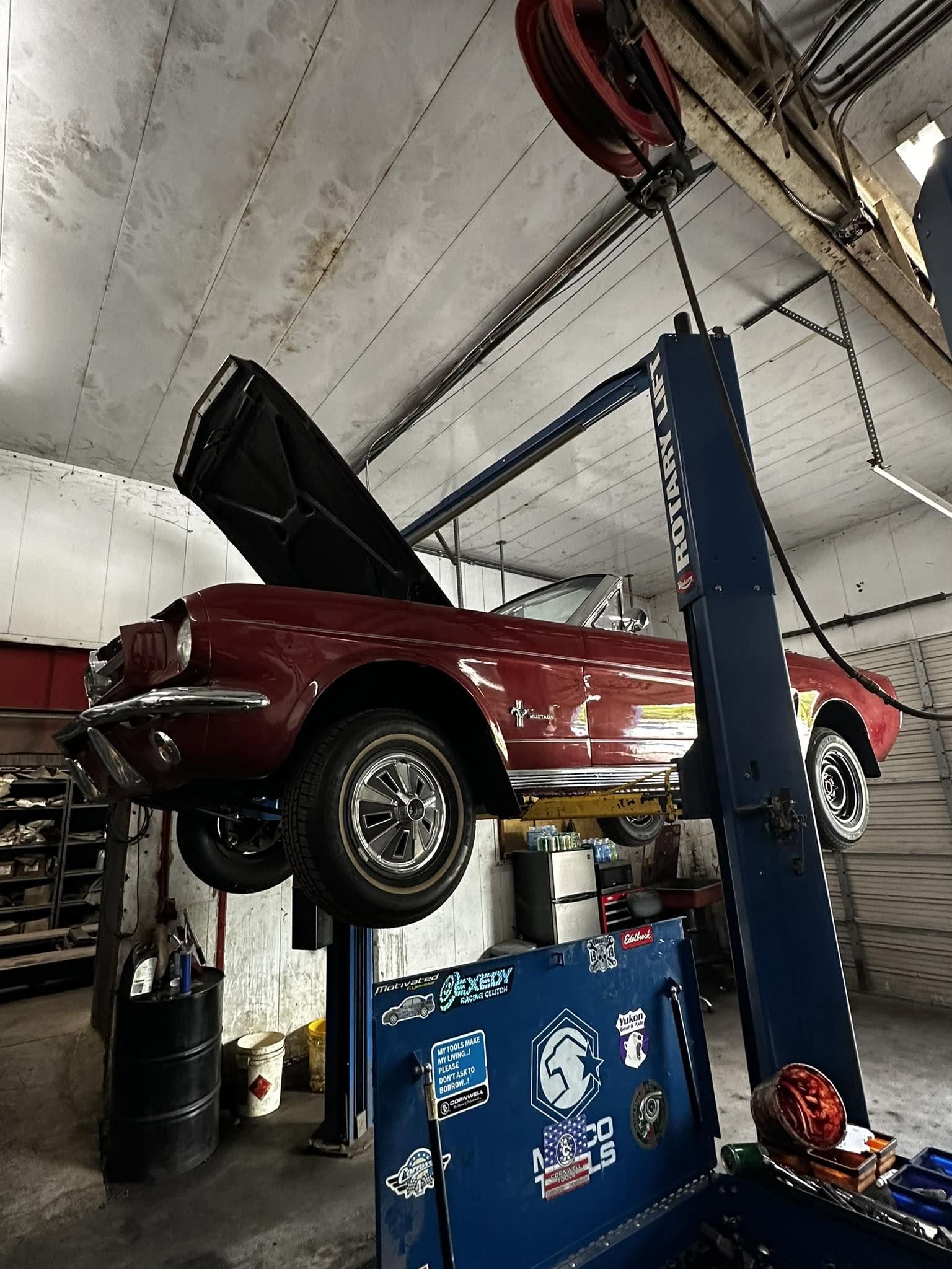 Classic Mustang on the service lift
